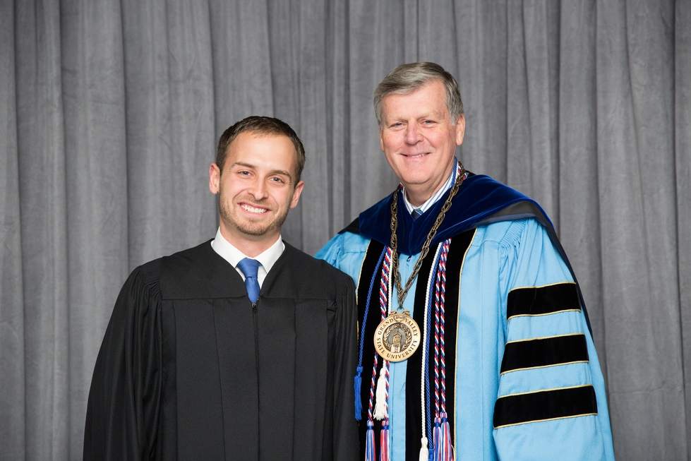 graduate with President Haas